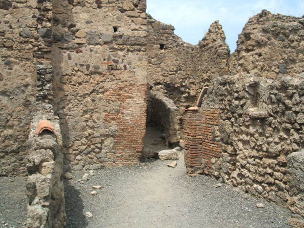 VI.8.8 Pompeii.  May 2005. Looking north-east towards two small rooms at rear.
