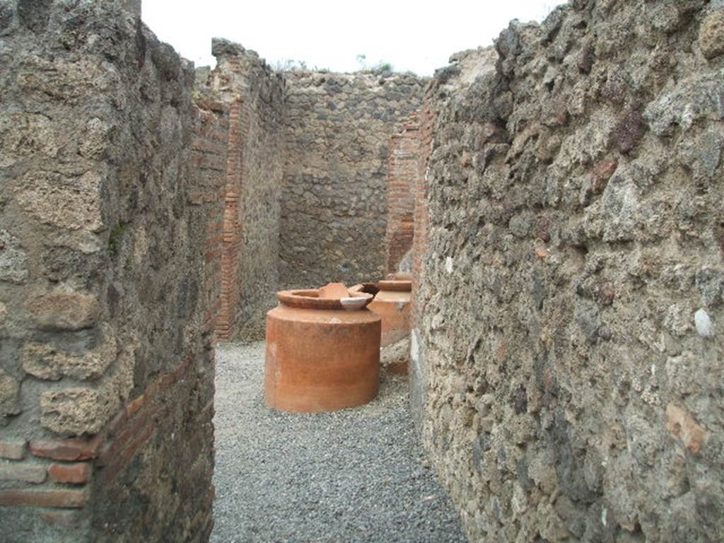 VI.8.10 Pompeii. May 2005. Looking north along and through site of steps to upper floor, towards VI.8.9.