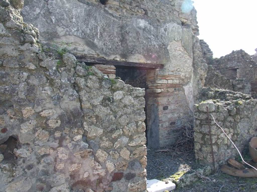 VI.8.20 Pompeii. March 2009.  Doorway into room 14 from peristyle.