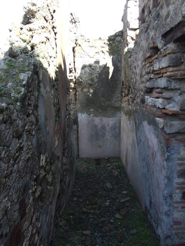 VI.8.20 Pompeii.  March 2009.  Room 13.  Looking east from doorway into Room 16. The site of the stairs to the upper floor is visible in the plaster on both side walls.