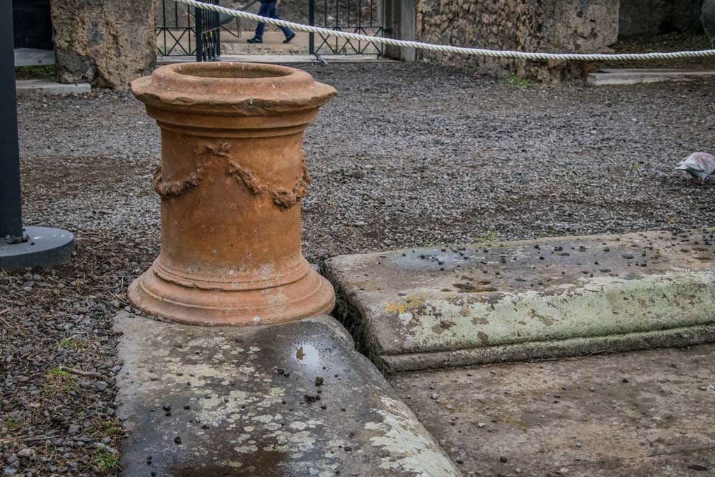 VI.8.22 Pompeii. January 2019. Terracotta puteal on north-east corner of impluvium in atrium. Photo courtesy of Johannes Eber