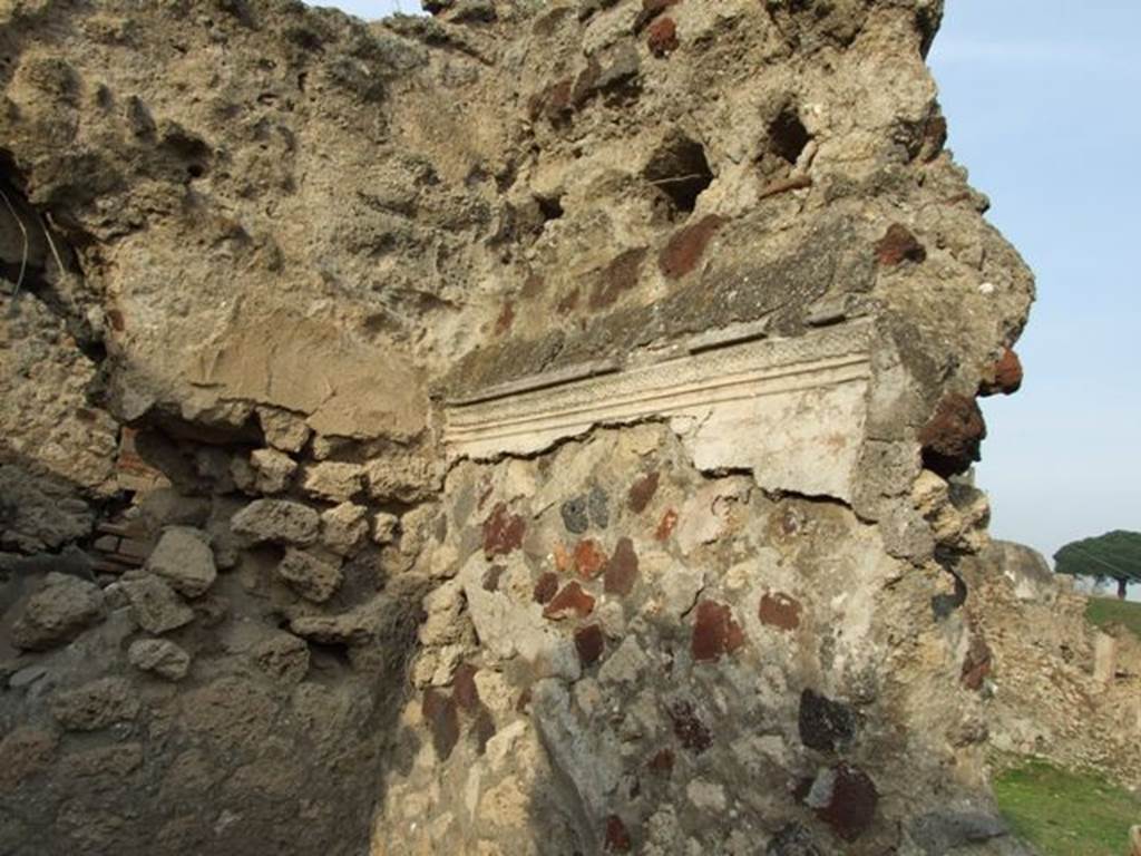 VI.9.1 Pompeii. December 2007. Room 19, with remains of stucco on east wall, in north-east corner, next to doorway leading into room 15, triclinium