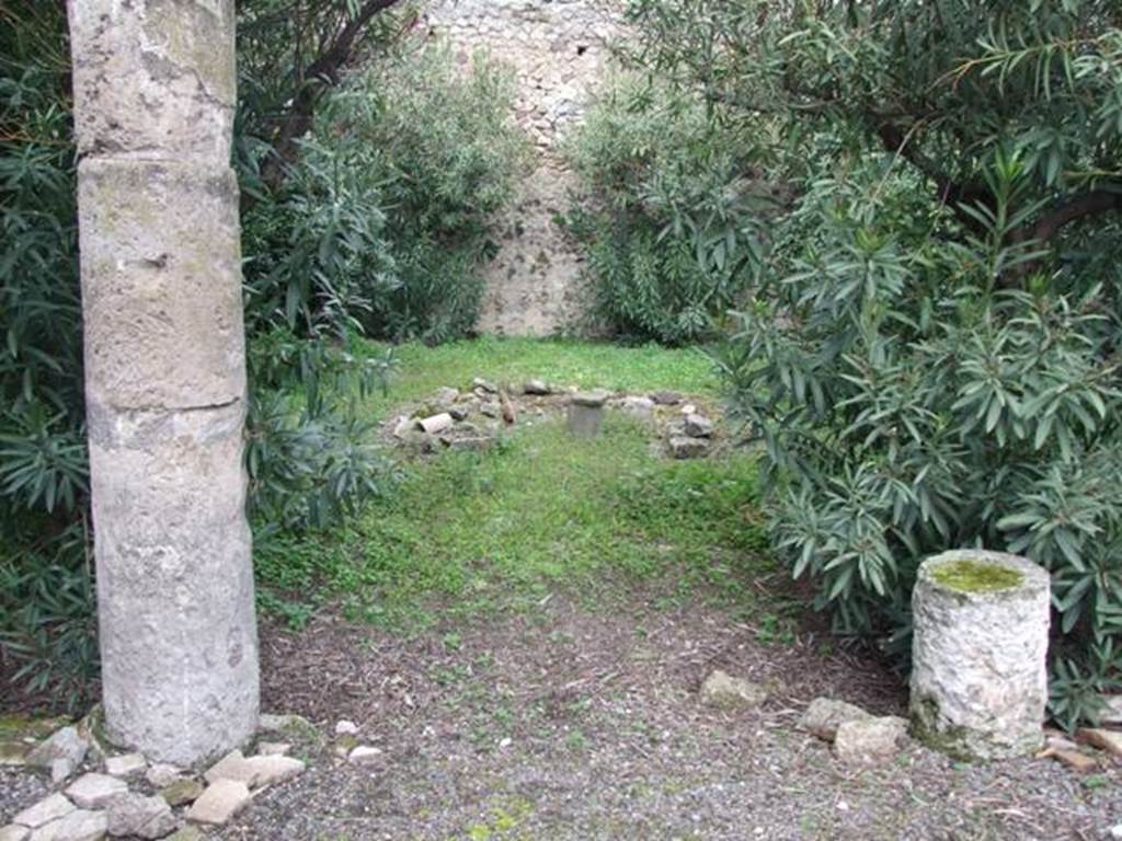 VI.10.11 Pompeii. March 2009. Room 17, remains of triclinium in centre of garden.  