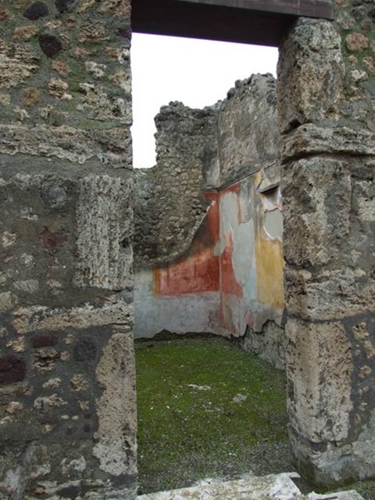 VI.11.9 Pompeii. March 2009. Doorway to room 6, cubiculum, looking west.