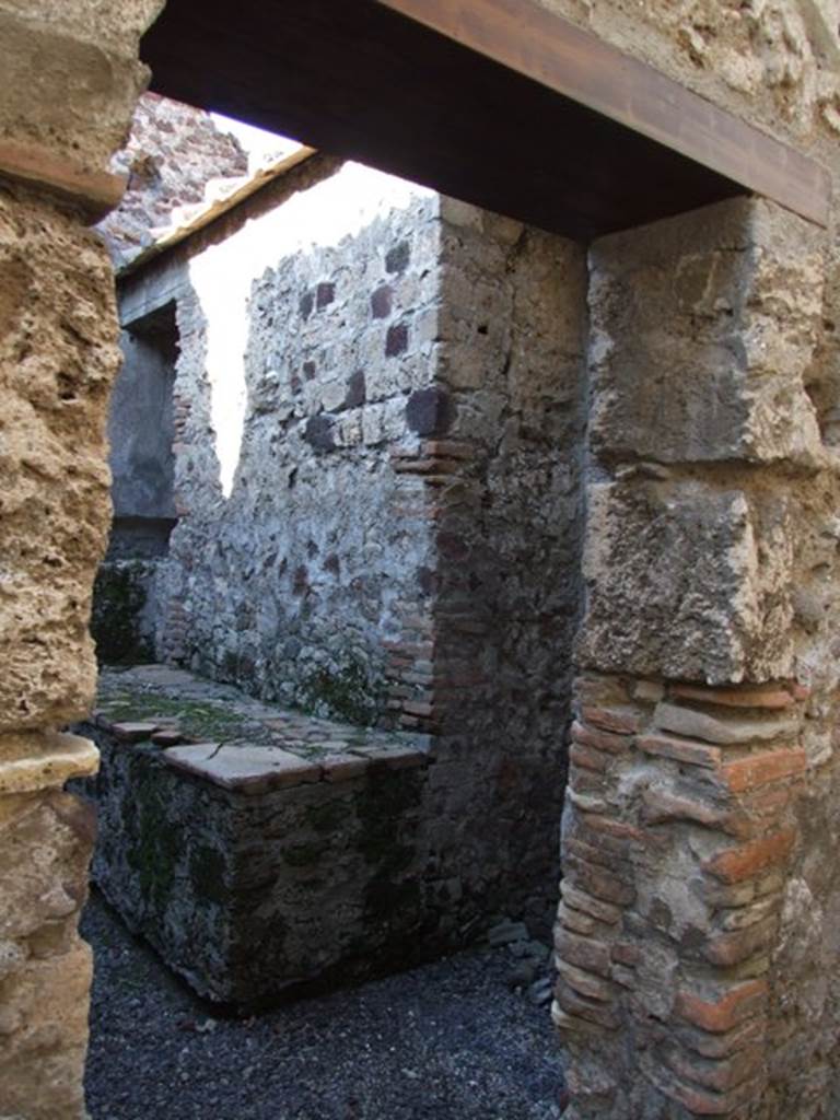 VI.11.9 Pompeii. December 2007. Room 13, doorway to kitchen. 