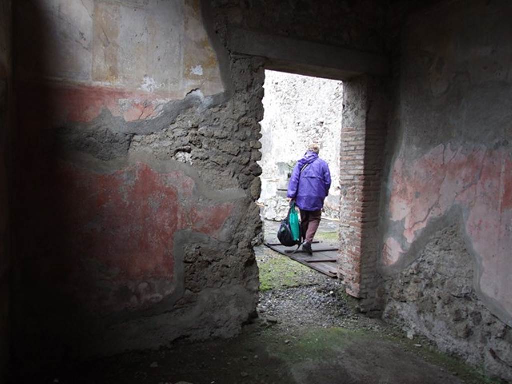 VI.11.9 Pompeii. December 2006. Room 20, apodyterium, looking north out from baths complex into room 16, the small bakery.