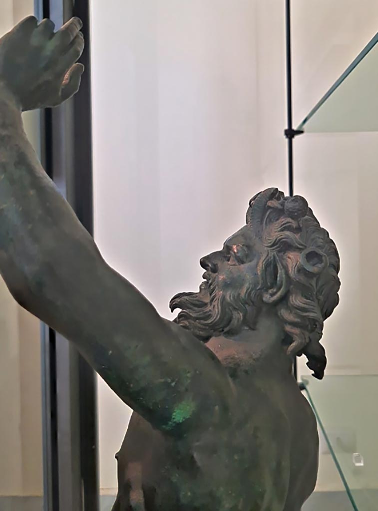 VI.12.2 Pompeii. September 2024.
Detail of bronze statuette of dancing faun in Naples Archaeological Museum. Photo courtesy of Giuseppe Ciaramella.
