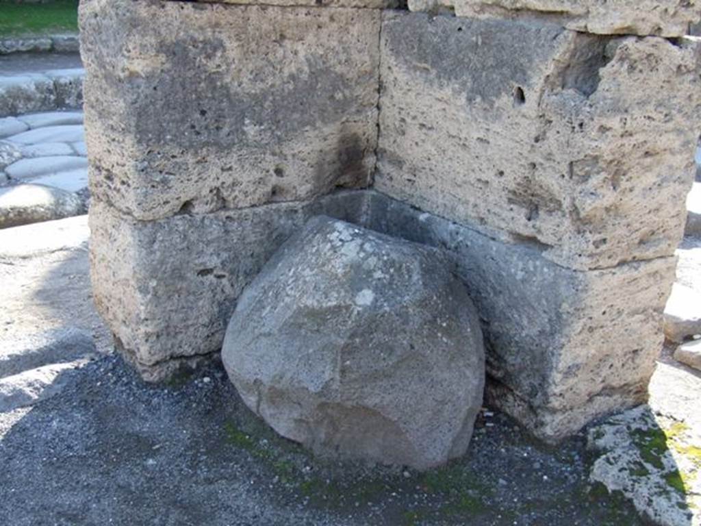 VI.14.1 Pompeii. December 2007. Large piece of volcanic tufa left in south-west corner between entrances VI.14.1 and VI.14.44.