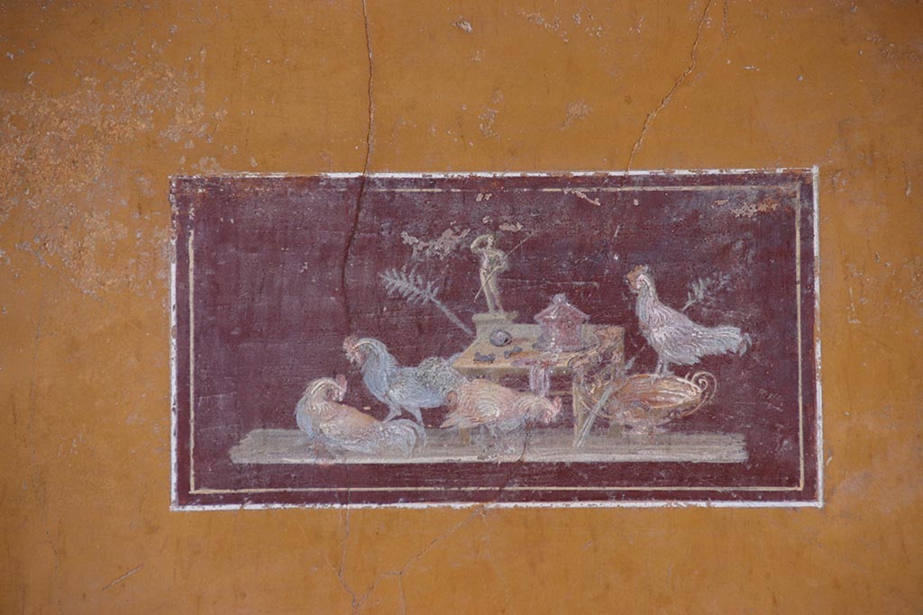 VI.15.1 Pompeii. October 2023. Detail of painted panel in middle of north wall of ala i. Photo courtesy of Klaus Heese.