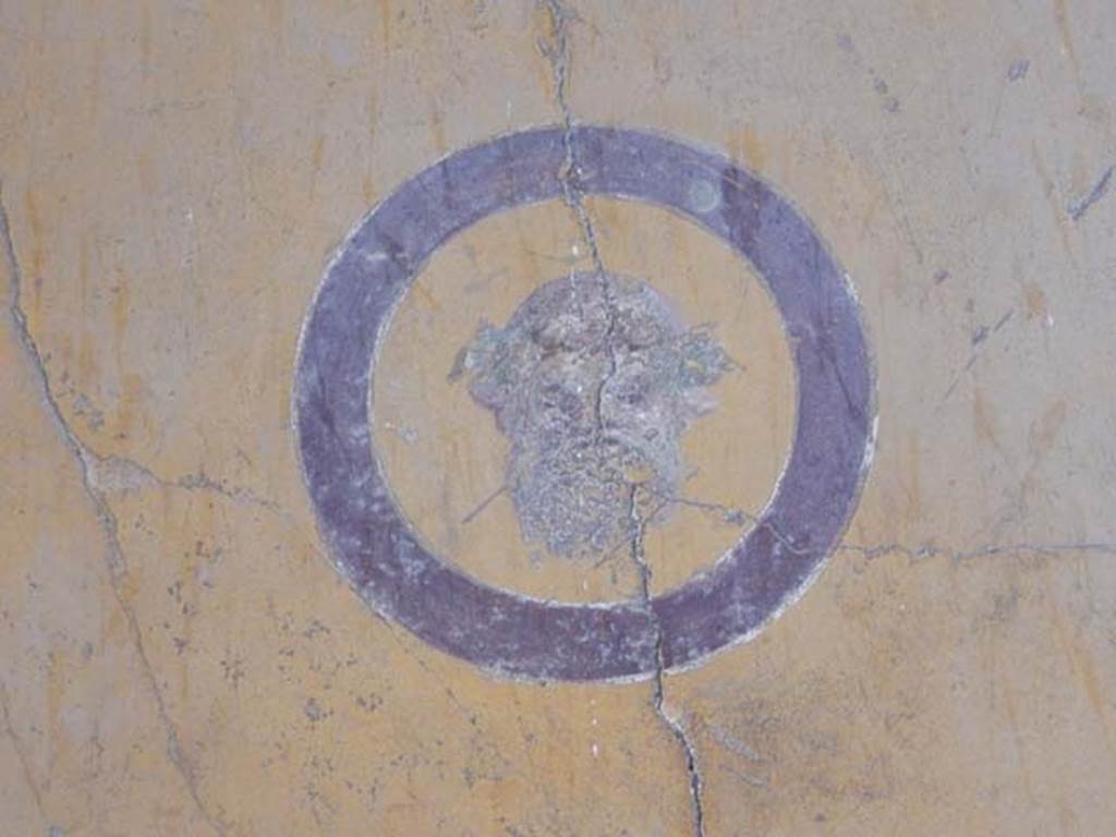 VI.15.1 Pompeii. October 2023. Painted medallion on south side of east wall. Photo courtesy of Klaus Heese.