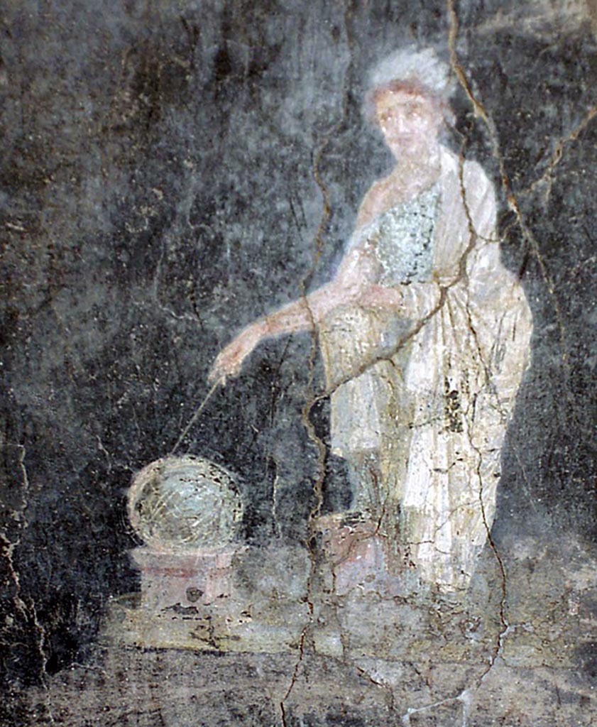 VI.15.1 Pompeii. October 2001. 
North-east corner, painting from north side of east portico between doorway to exedra and window to ala.
Painted panel on black background of Urania in green robe with white fringed cloak, with her head surrounded by a crown of feathers, pointing with a stick to the globe resting on a square base. Photo courtesy of Peter Woods.
