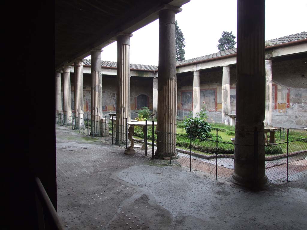 VI.15.1 Pompeii. December 2006. Looking south-west across peristyle, from exedra on north-east side. 