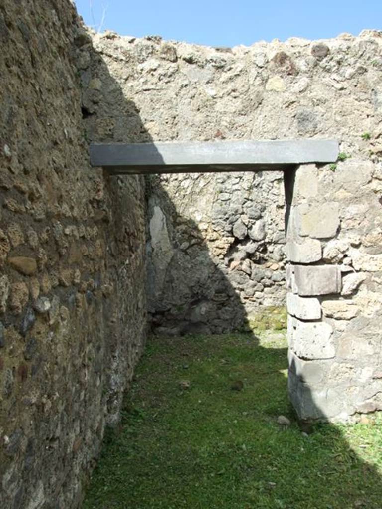 VI.15.6 Pompeii. March 2009. Doorway to room 11. Storeroom. Looking north.