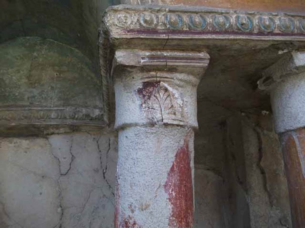 VI.15.8 Pompeii. May 2010. Detail of column and stucco on household shrine in the garden.
