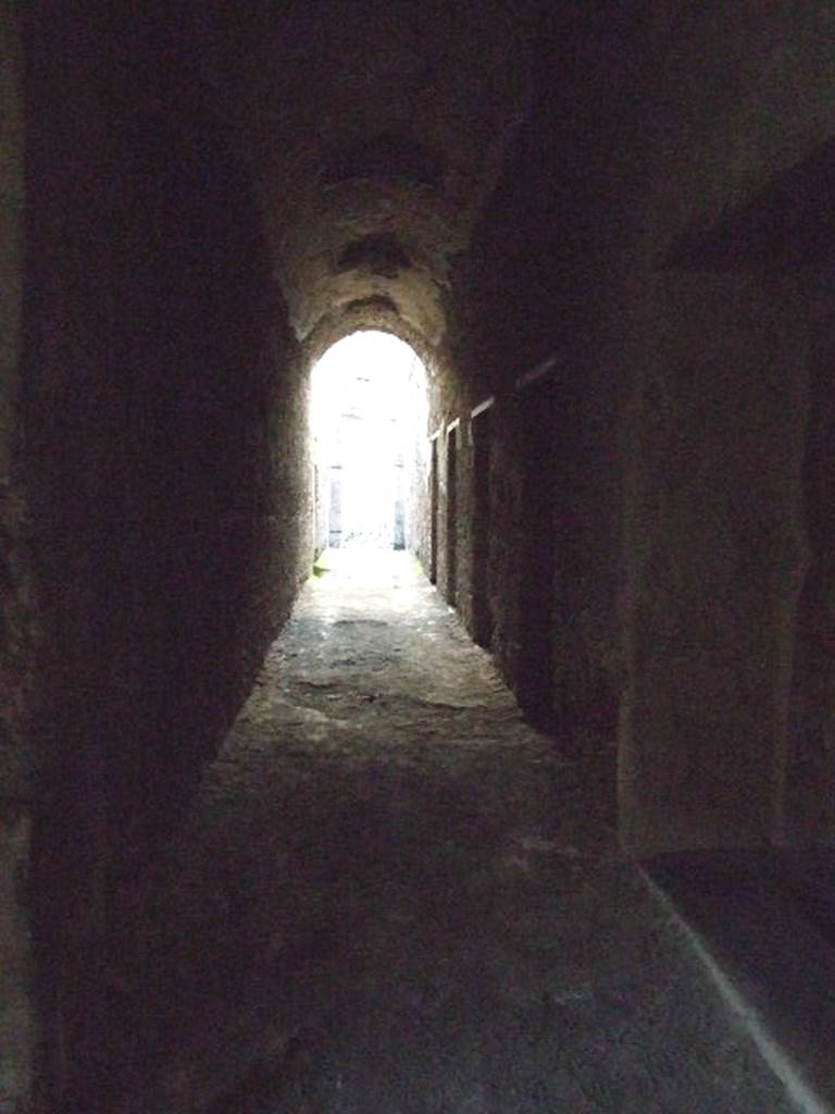 VII.1.8 Pompeii. December 2006. Looking west along corridor J to VII.1.50. After the latrine O are the four private baths N on right.