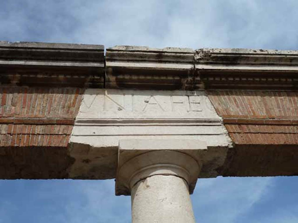 VII.8 Pompeii Forum. May 2010. Part of the inscription in large letters on the entablature of the portico, reading -
VNIA FE
