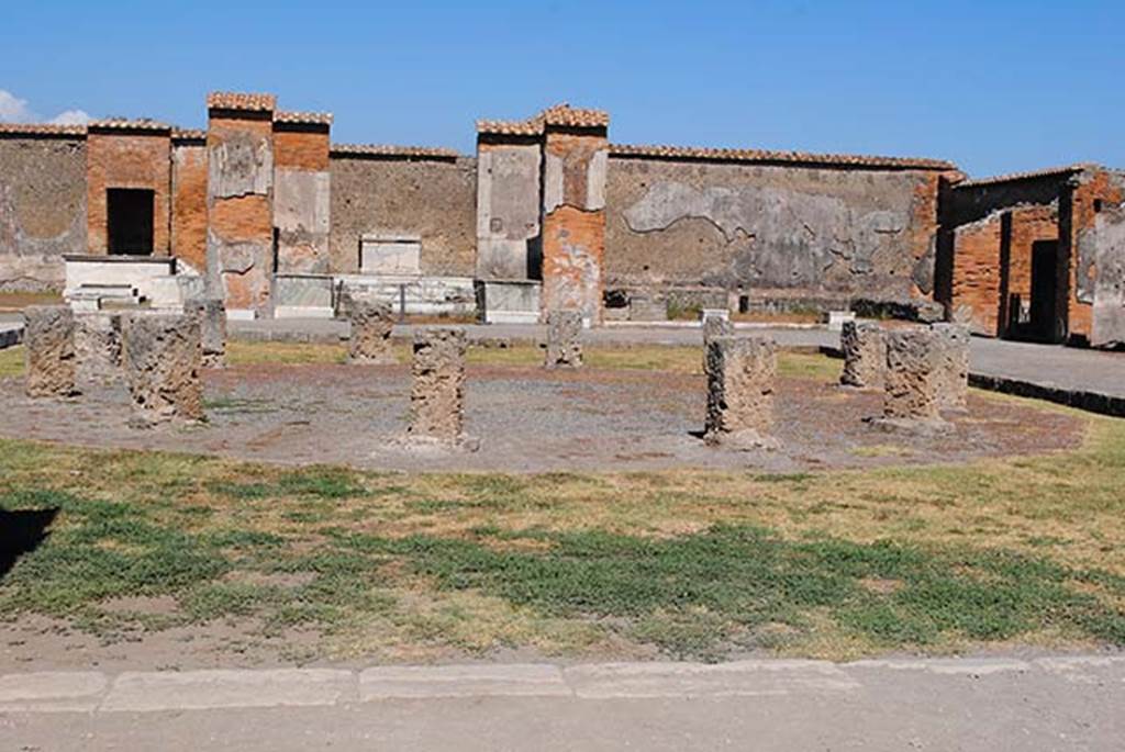 VII.9.7 Pompeii. July 2012. Looking east across Macellum. Photo courtesy of John Vanko. His father took the identical photo in February 1952, see below.
