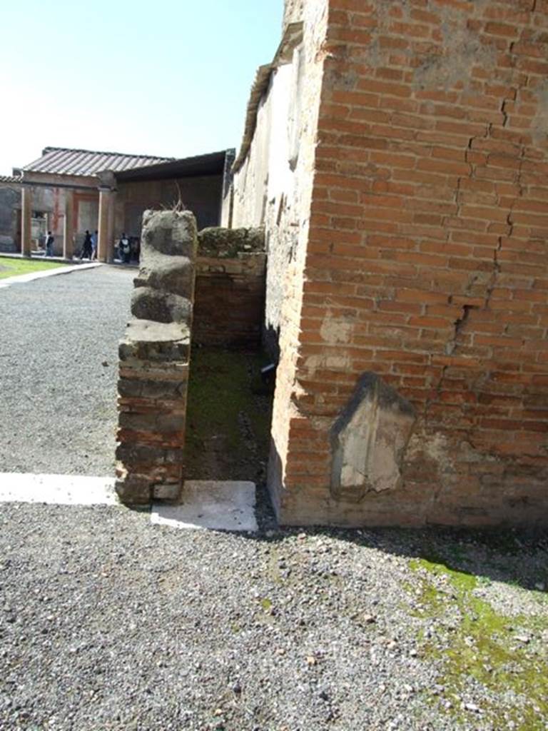 VII.9.7 and VII.9.8 Pompeii. Macellum. March 2009. Looking west along the north side.