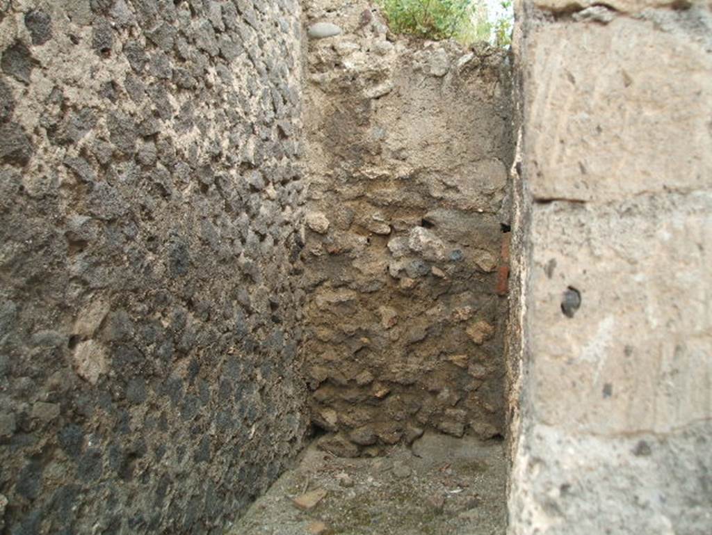 VIII.2.12 Pompeii. May 2005. Looking north to blocked doorway.