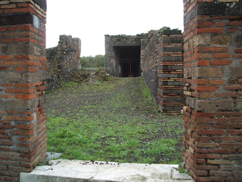 VIII.2.36 Pompeii. December 2004. 
Looking south towards remains of stairs to the peristyle of VIII.2.37, centre left. In the centre is the passageway to the lower levels.
