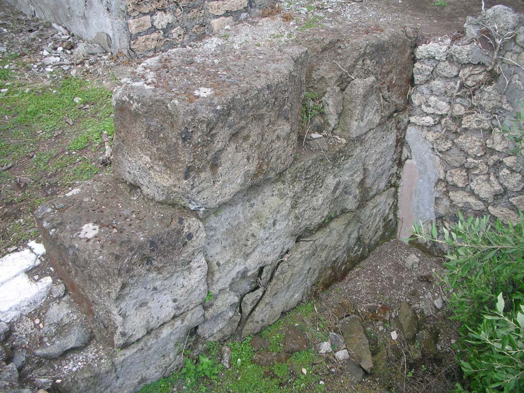 VIII.2.36-37 Pompeii. May 2011. 
Lower level, looking north-east towards detail of walling and remaining stucco. Photo courtesy of Ivo van der Graaff.
