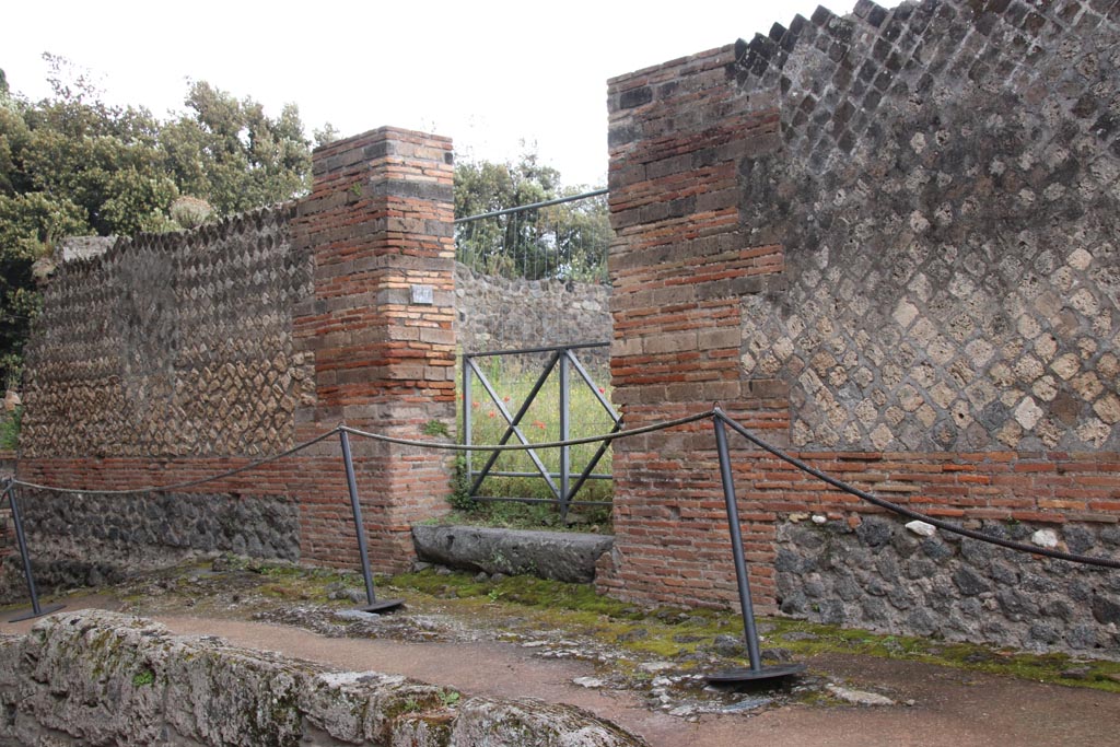 VIII.2.37 Pompeii. May 2024. Looking south-east on Via della Regina towards entrance doorway. Photo courtesy of Klaus Heese.