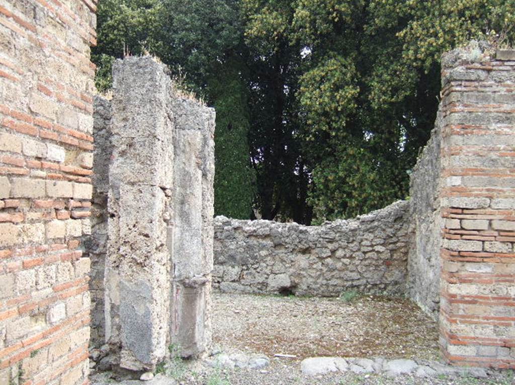 VIII.2.39 Pompeii.  May 2006. Doorways to Rooms c and d, in north east corner of atrium.