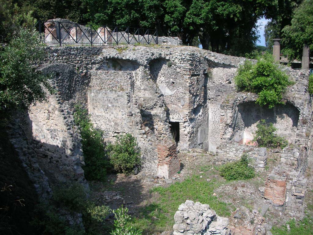 VIII.2.39 Pompeii. May 2011. 
First lower floor, looking north-east across room with a door and two windows that opened onto a wide terrace at the rear, on right.
Photo courtesy of Ivo van der Graaff.

