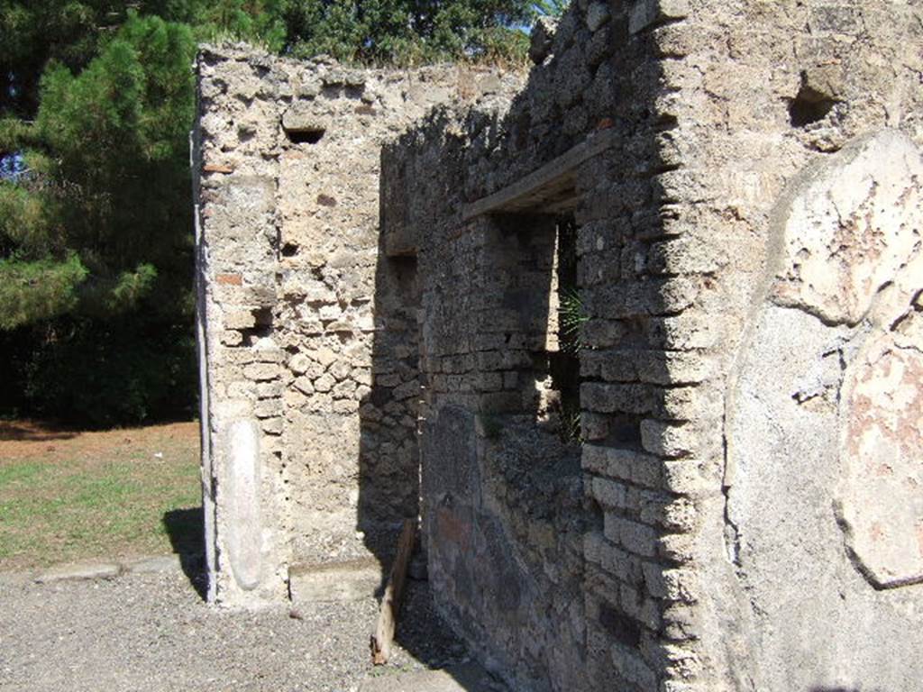 VIII.3.14 Pompeii. September 2005. Looking north along east side of atrium, towards doorway, and window of oecus fenestratum.
According to Helbig, and described as found in the “First corridor, on right out of atrium”, were paintings of Centaurs, (Helbig no 503).
In the predella: Battle of Five Pygmies & 5 Cocks, (Helbig no. 1529).
See Helbig, W., 1868. Wandgemälde der vom Vesuv verschütteten Städte Campaniens. Leipzig: Breitkopf und Härtel. (nos.503 and 1529)
According to Fiorelli -
“From the walkways of the atrium, of which the eastern still holds the remains of a small painting, showing a Bacchante being carried on the back of a Centaur, and below, a fight of Pygmies ......”
See Pappalardo, U., 2001. La Descrizione di Pompei per Giuseppe Fiorelli (1875). Napoli: Massa Editore. (p.124)

