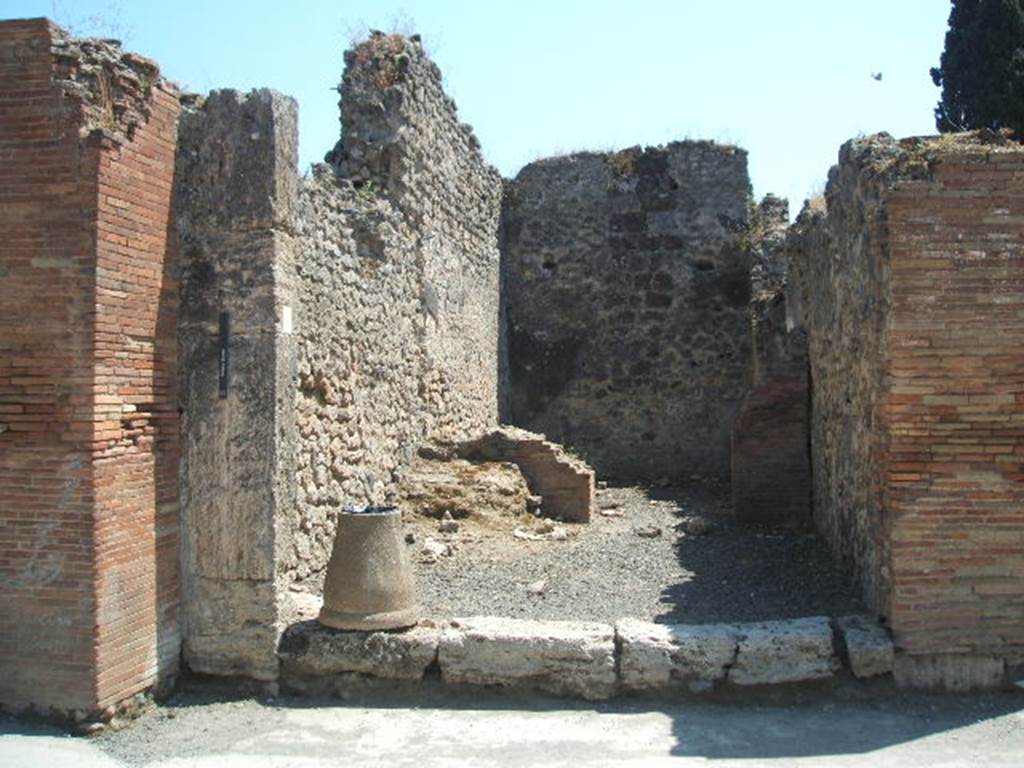 VIII.4.11 Pompeii. May 2005.  Entrance. According to Della Corte this shop and the annexed modest dwelling was held by an unknown Pigmentarius.
Many colouring materials and also of a considerable quantity of bitumen was found. See Della Corte, M., 1965.  Case ed Abitanti di Pompei. Napoli: Fausto Fiorentino. (p.237)

