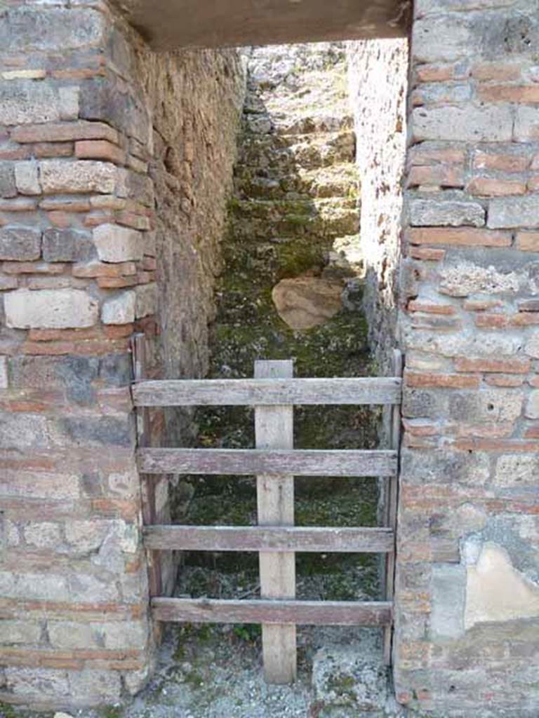 VIII.5.24 Pompeii. May 2010. Room 12, stairs to upper floor.