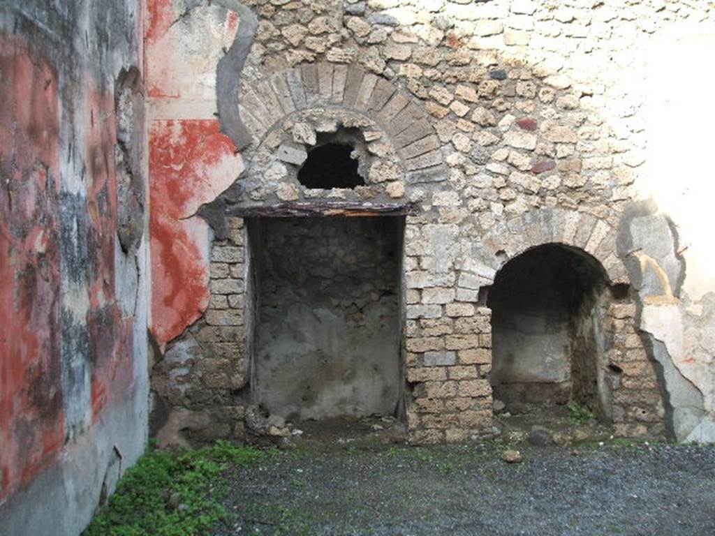 VIII.5.24 Pompeii. December 2004.  Room 13, two recesses in the north wall, under the stairs to upper floor.