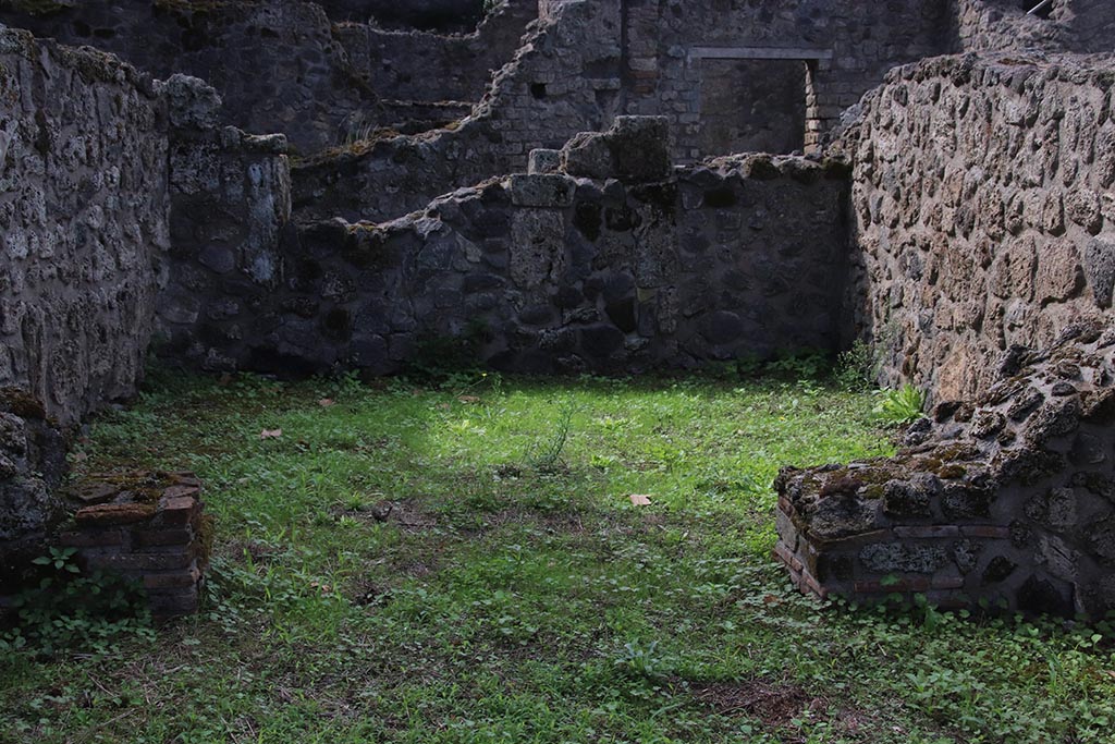 VIII.7.3 Pompeii. October 2024. Looking towards rear room from shop-room. Photo courtesy of Klaus Heese.