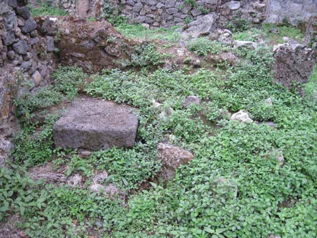 VIII.7.6 Pompeii. September 2010. Feature in south-east corner of end of portico, looking south. Photo courtesy of Drew Baker.
