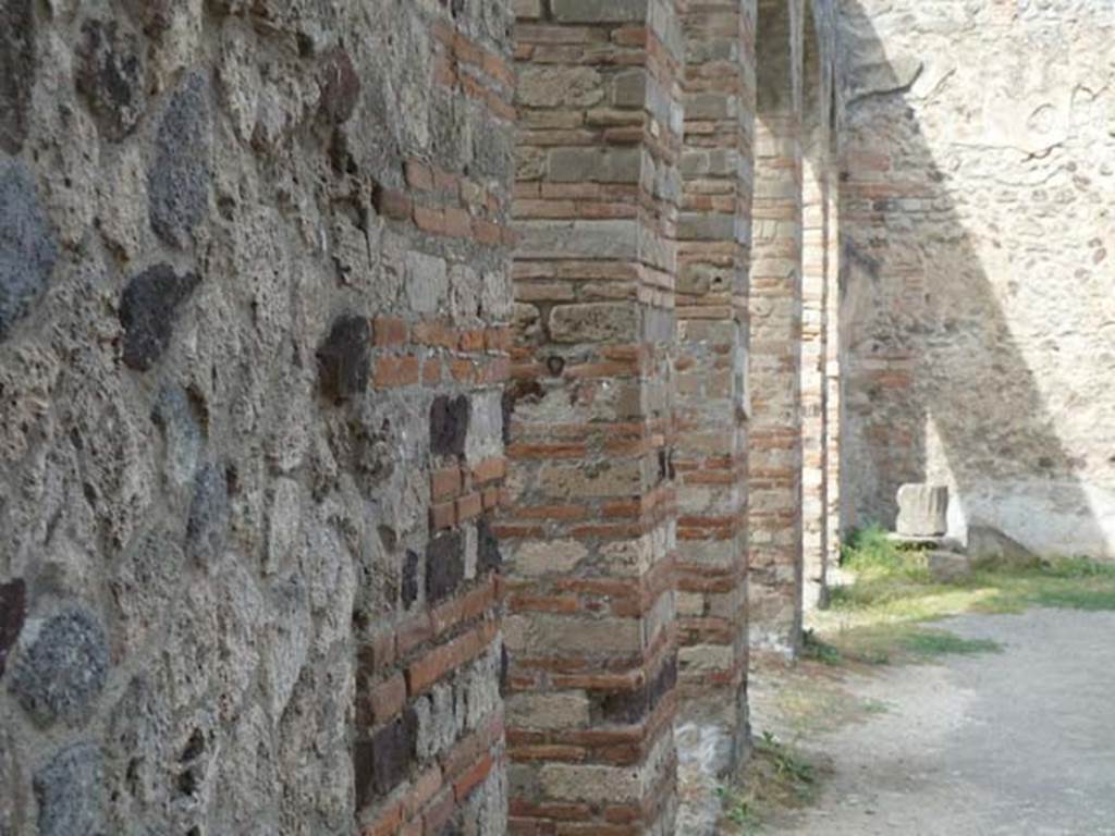 VIII.7.28 Pompeii. September 2015. Looking north along west portico past the 5 arches of the Ekklesiasterion. 