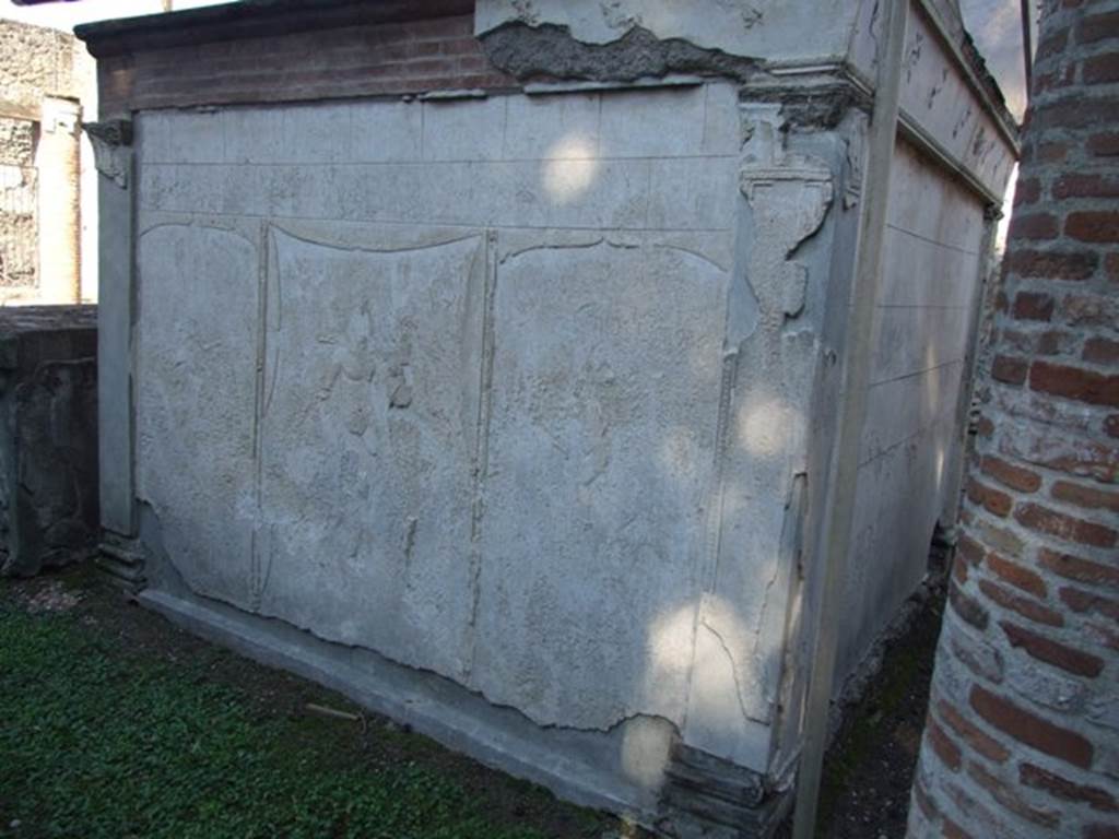 VIII.7.28 Pompeii.  March 2009. Purgatorium, west side. Detail of stucco. 
The centre panel shows Mars and Venus, with a cupid in the side panels.
