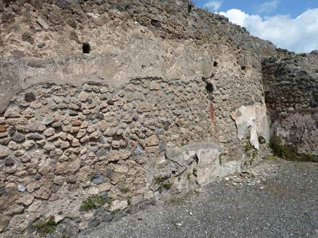 IX.1.1 Pompeii. May 2010. North wall of shop.