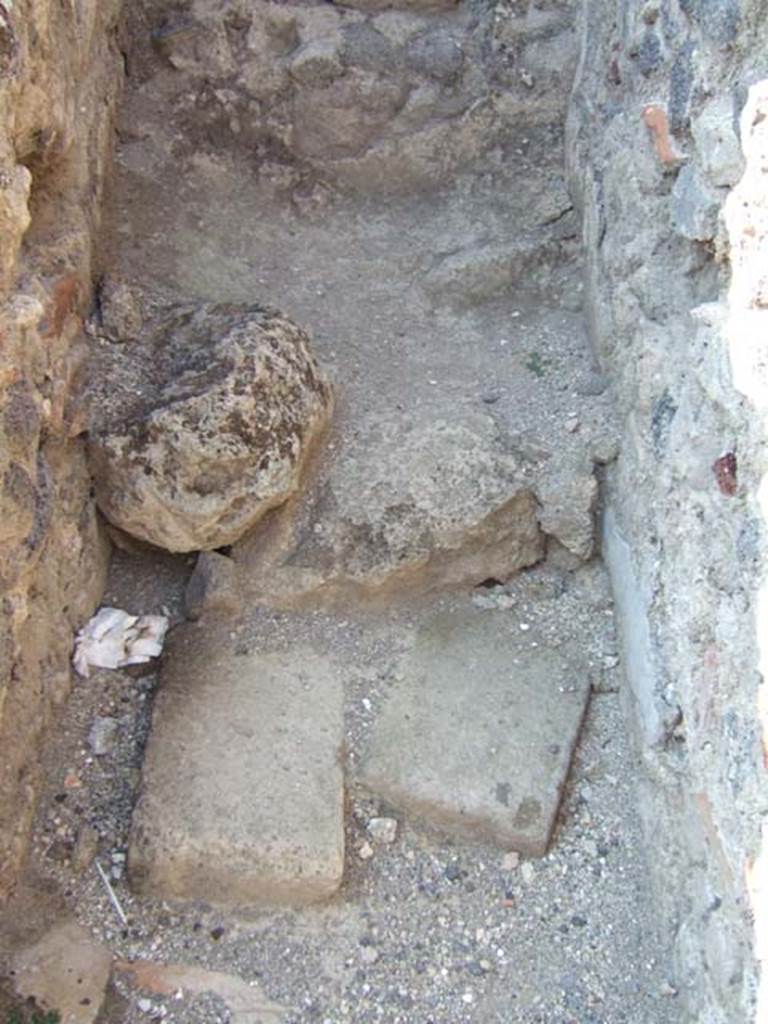 IX.1.1 Pompeii. September 2005. 
Looking north to latrine, under stairs leading to upper floor from IX.1.34.
