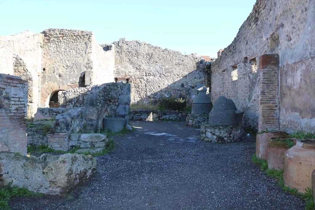 IX.1.3 Pompeii. December 2018. Looking east across bakery. Photo courtesy of Aude Durand.

