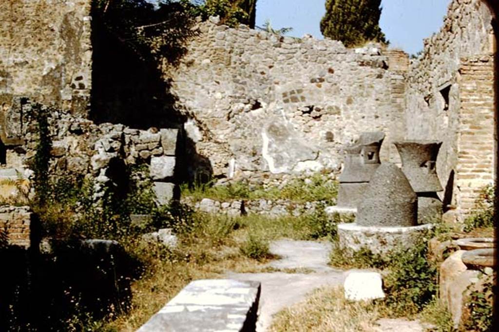 IX.1.3 Pompeii.  1959. Looking east across bakery. Photo by Stanley A. Jashemski.
Source: The Wilhelmina and Stanley A. Jashemski archive in the University of Maryland Library, Special Collections (See collection page) and made available under the Creative Commons Attribution-Non Commercial License v.4. See Licence and use details.
J59f0227
