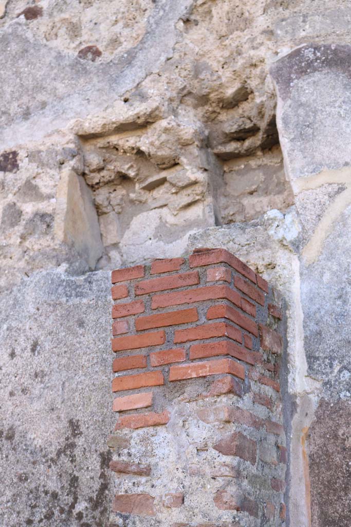 IX.1.3 Pompeii. December 2018. 
Masonry pilaster against south wall, with two recesses above. Photo courtesy of Aude Durand.
