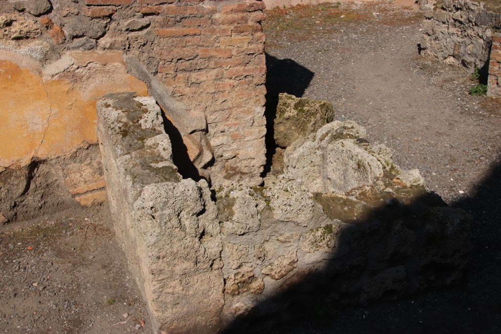 IX.1.3 Pompeii. October 2022. 
Looking towards north wall of bakery shop, with doorway to cubiculum, on right. Photo courtesy of Klaus Heese
