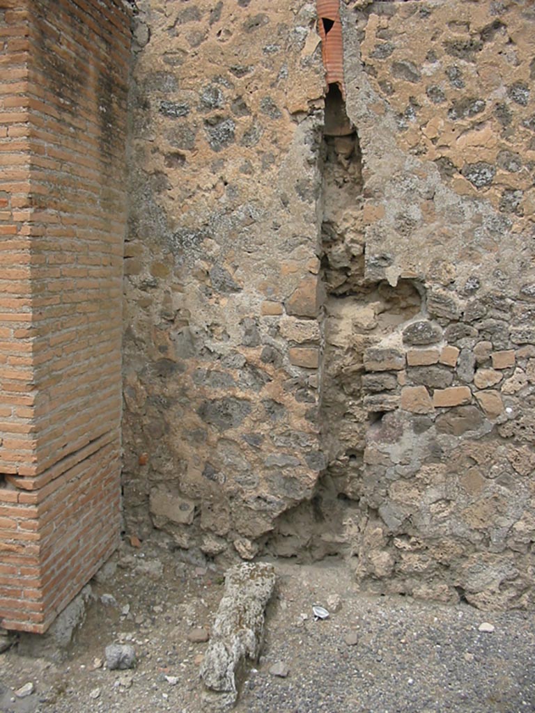 IX.1.6 Pompeii. May 2003. 
Site of latrine, under stairs to upper floor, on north side of entrance. Photo courtesy of Nicolas Monteix.
