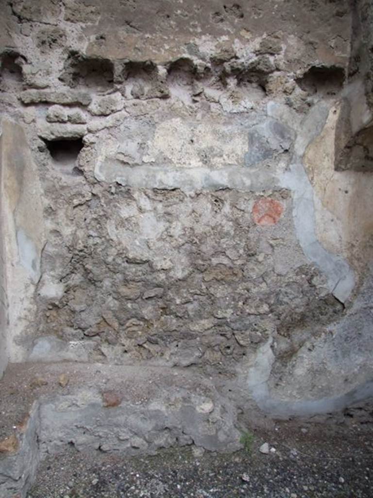 IX.1.12 Pompeii. December 2007. North wall of room at end of corridor on north-west side of peristyle under the stone steps.