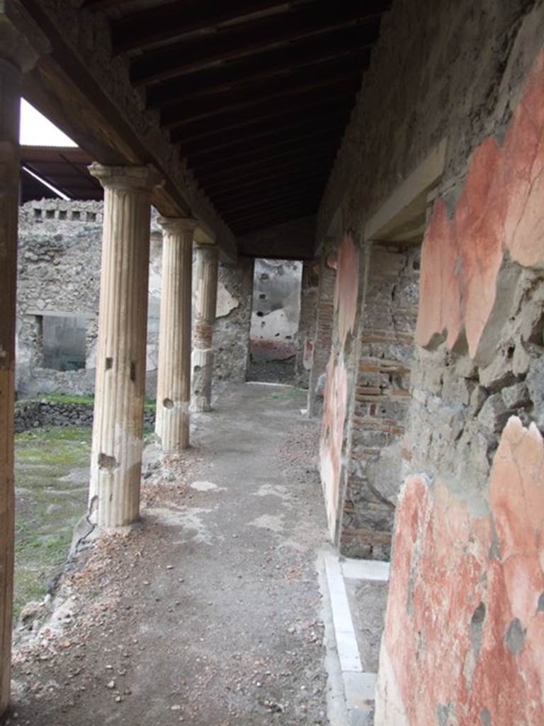 IX.1.22 House of M. Epidi Sabini.  December 2007.  Room 14.  First peristyle looking west along north side in front of doorway to room 19.