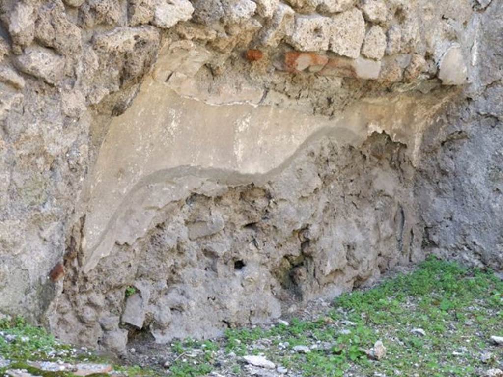 IX.1.27 Pompeii. March 2009. West wall, with remains of recess, which would have been under the stairs.