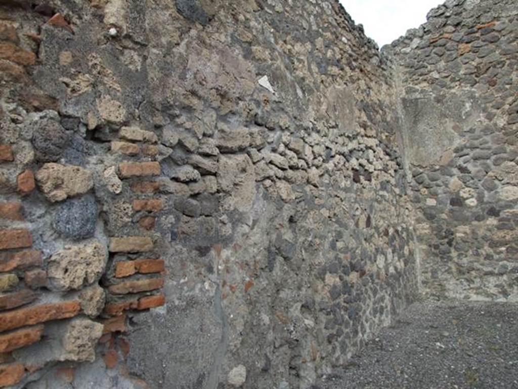 IX.2.3 Pompeii. December 2007. North wall of shop.