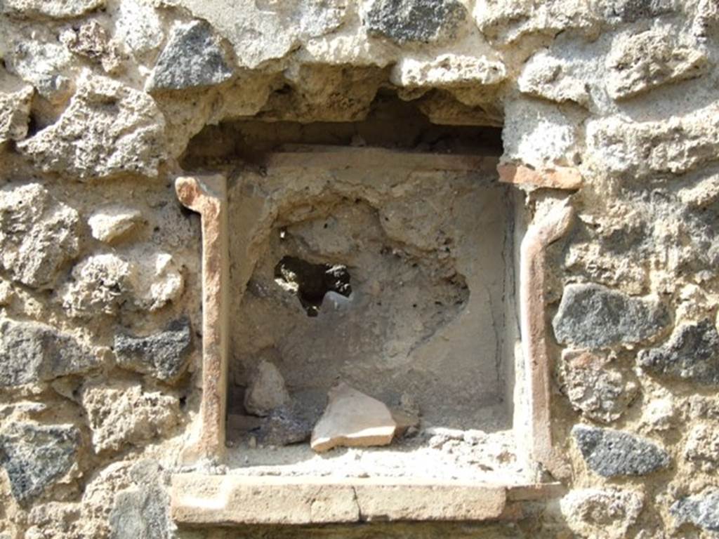 IX.2.5 Pompeii. March 2009. Niche lararium in north wall of garden. According to Boyce, this square niche was called la nicchia de Penati, by Fiorelli. See Boyce G. K., 1937. Corpus of the Lararia of Pompeii. Rome: MAAR 14. (p. 80)  See Pappalardo, U., 2001. La Descrizione di Pompei per Giuseppe Fiorelli (1875). Napoli: Massa Editore. (p.141)
