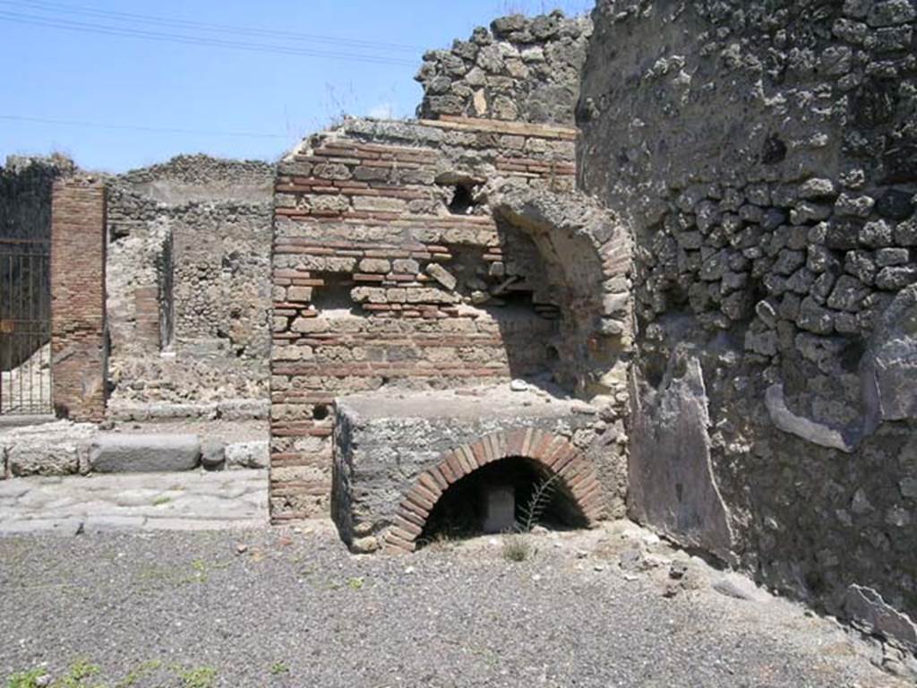 IX.2.25 Pompeii. June 2005. Looking towards north-east corner with hearth. Photo courtesy of Nicolas Monteix.