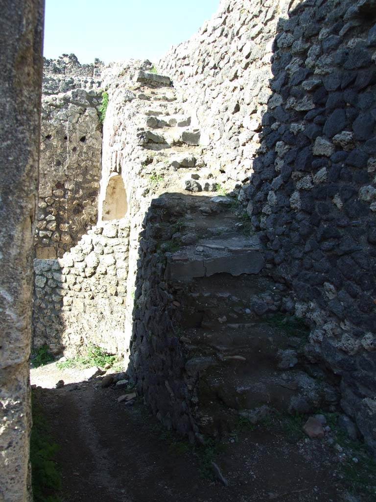 IX.3.2 Pompeii. March 2009. Stone staircase on east wall.